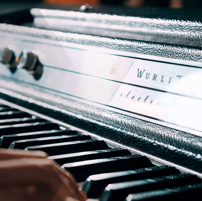 Close of a person playing an electric piano